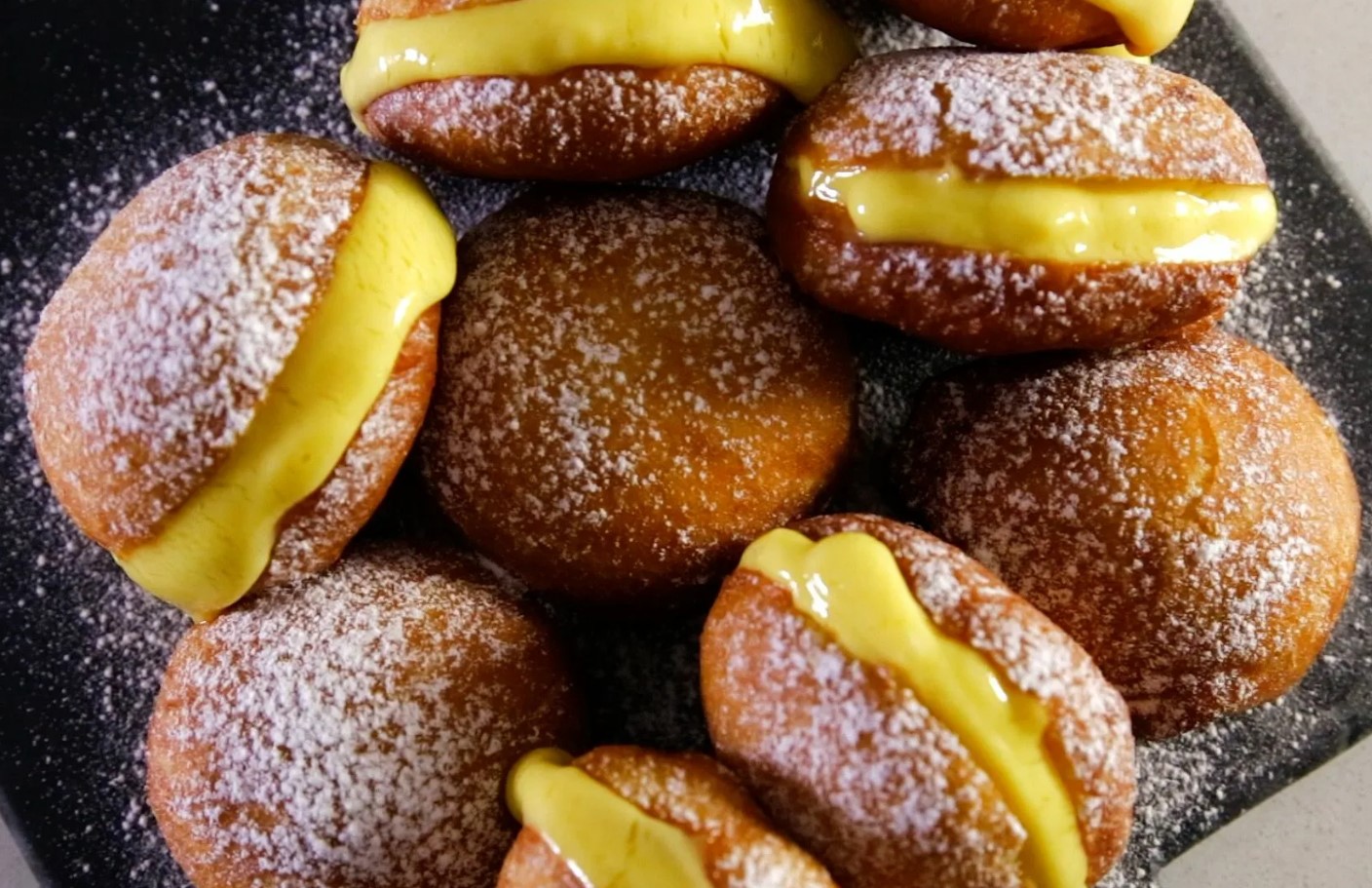 Portugali sõõrikud, mis sulavad suus nagu lumi: proovi kodus bolas de Berlim